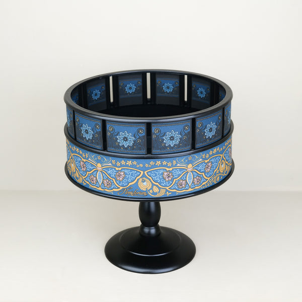 Zootrope jouet d'imagination fabrication espagnole Hemisferium 20 cm de diamètre 22 cm de hauteur décor bleu et doré